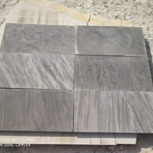 Sagar black stone is a durable, with a dark grey to black color and occasional yellow shading. It is a versatile and weather-resistant material used for various applications like flooring, wall cladding, and paving, and is available in multiple finishes such as honed, polished, and sandblasted.