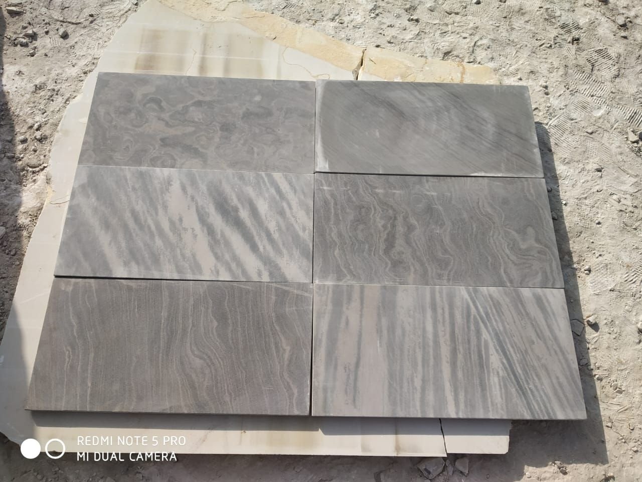 Sagar black stone is a durable, with a dark grey to black color and occasional yellow shading. It is a versatile and weather-resistant material used for various applications like flooring, wall cladding, and paving, and is available in multiple finishes such as honed, polished, and sandblasted.